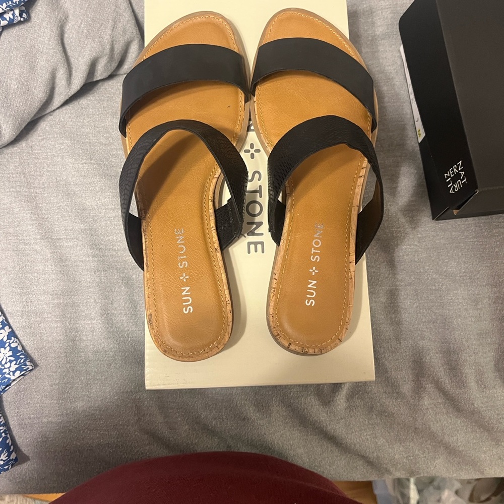Sun + Stone Easten black slide sandal.